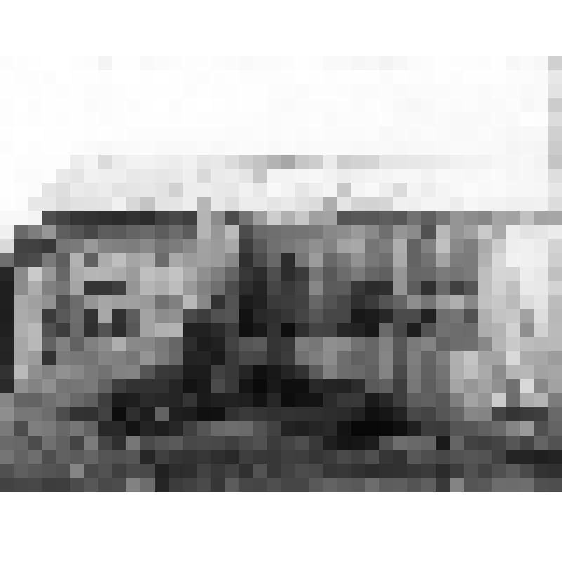Фотография. Здание Лобвинской "Фотографии" на фоне которой местный фотограф Балакин