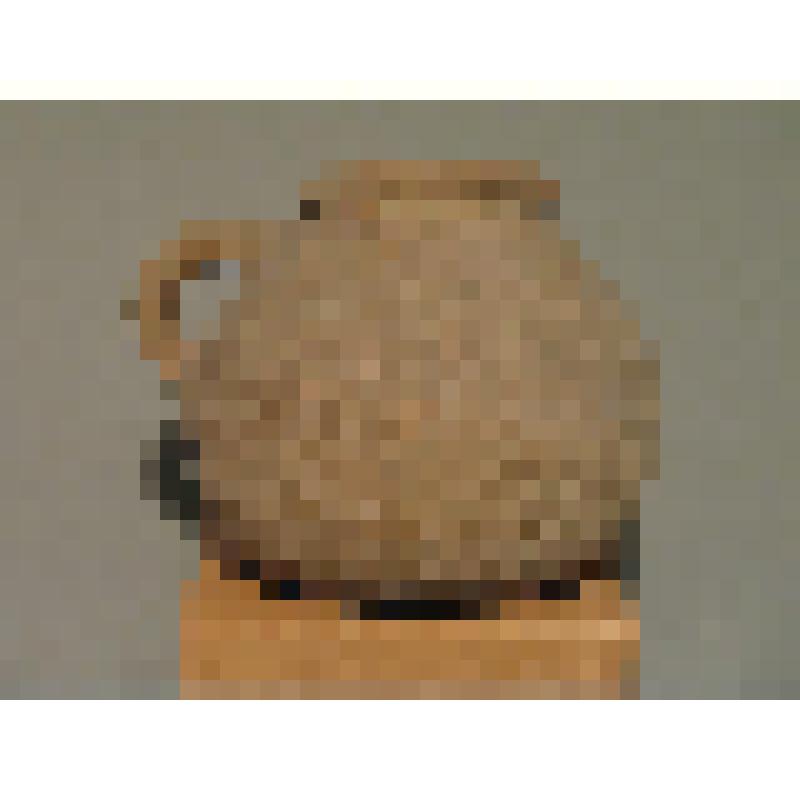 Кружка (?) из желтовато- розовой глины, плоскодонная, с шарообразным туловом с невысоким, отогнутым венчиком