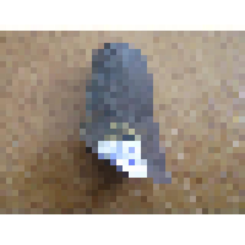 Осколок бурого кремня от отбитого орудия