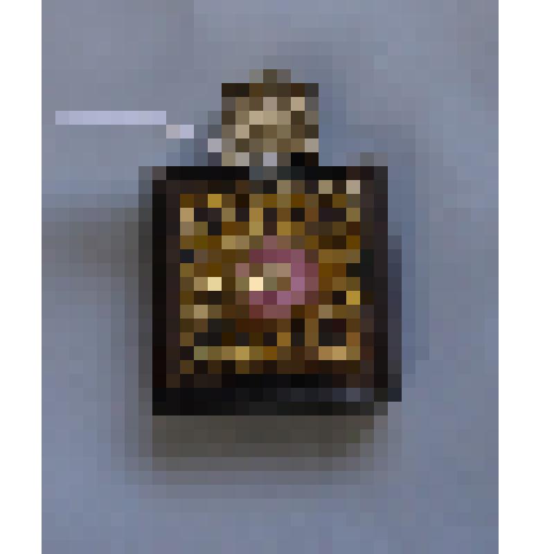 Флакон для духов. Изготовлен из сиреневого прозрачного стекла кубической формы с рельефным цветком из металла с розовыми лепестками и золотистыми листьями на лицевой стороне. СССР, 1970-1980-е годы