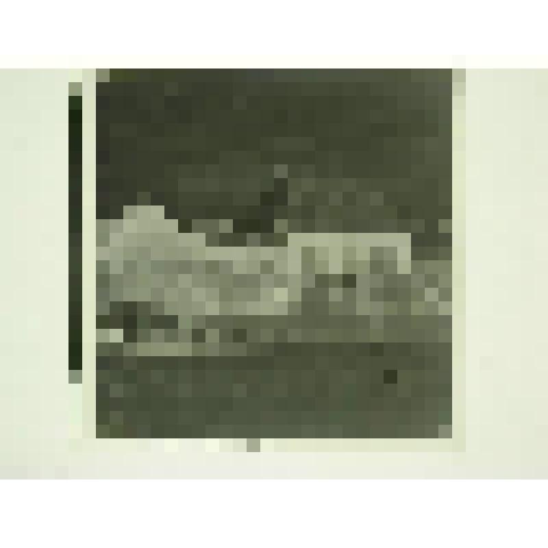 Дом А.П.Мартынова. Ул. П.Морозова, 10-12. втор.пол. XIX в. Челябинская  обл., г. Карабаш, пос. Южный (с.Саймоновское). Дом А.П.Мартынова. Ул. П.Морозова, 10-12, втор.пол. XIX в. Общий вид усадьбы с улицы