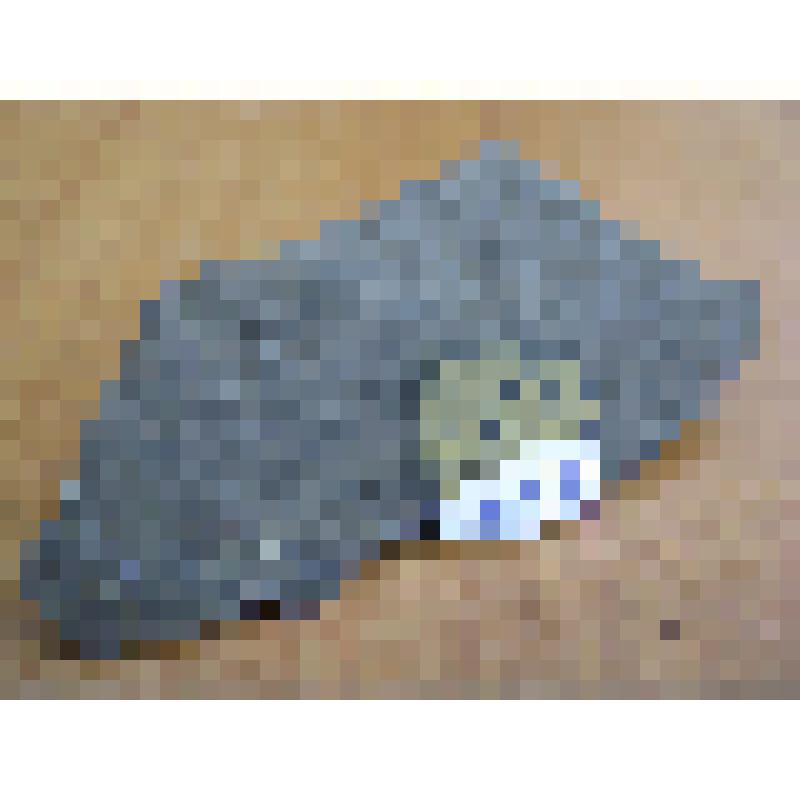 Обломок орудия темно-серого цвета