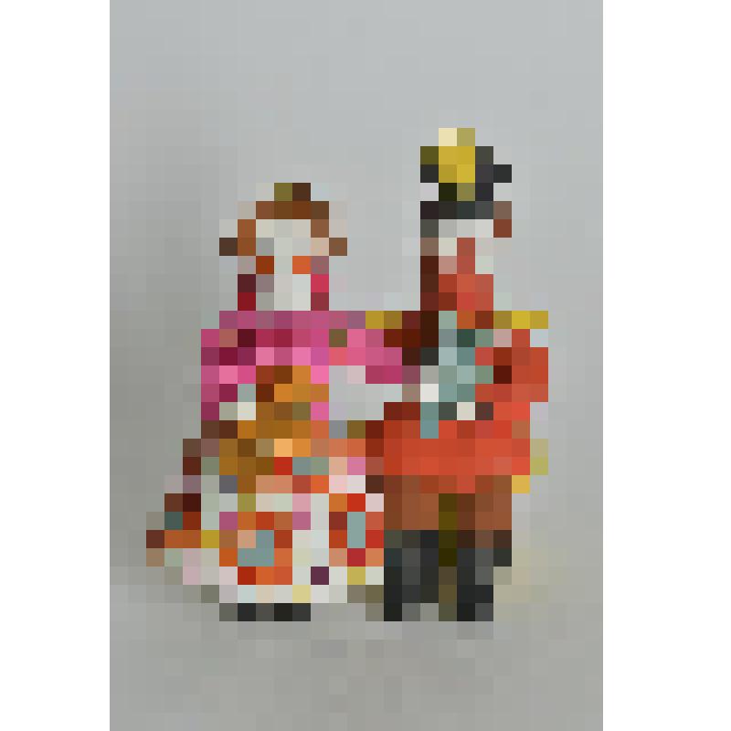 Игрушка «Сидящая пара»