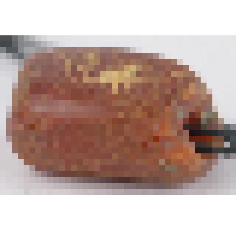 Янтарная бусина удлиненных пропорций с четырьмя неясными гранями