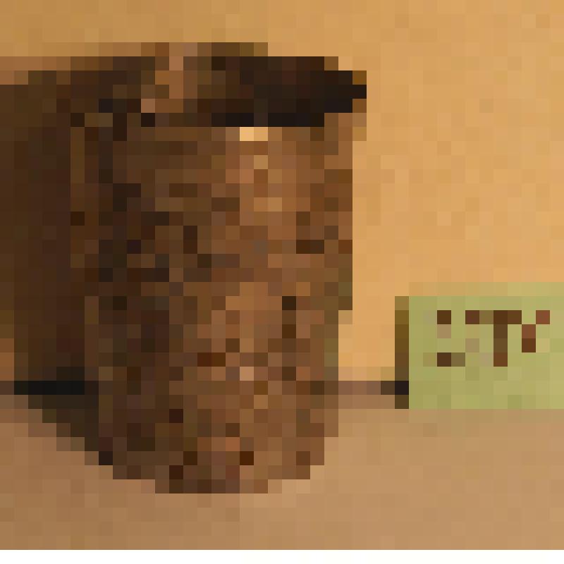 Стакан, расширяющийся кверху, со слегка отогнутым краем, с тремя чеканными овальными медальонами с изображениями