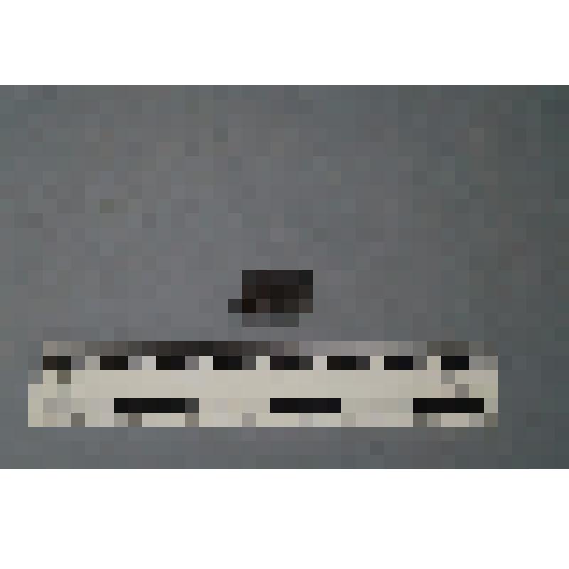 Пластинка панцирная во фрагменте из кургана 3 Озерновского III могильника. Оренбургская область, 1985-1990 годы