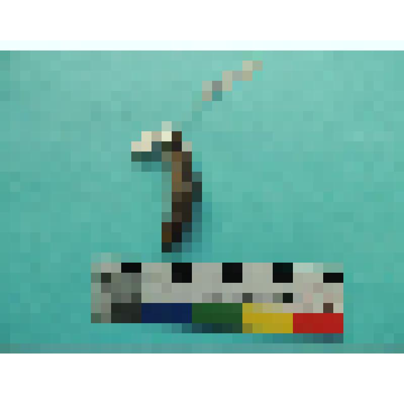 Амулет из клыка с отверстием для привешивания в корневой части