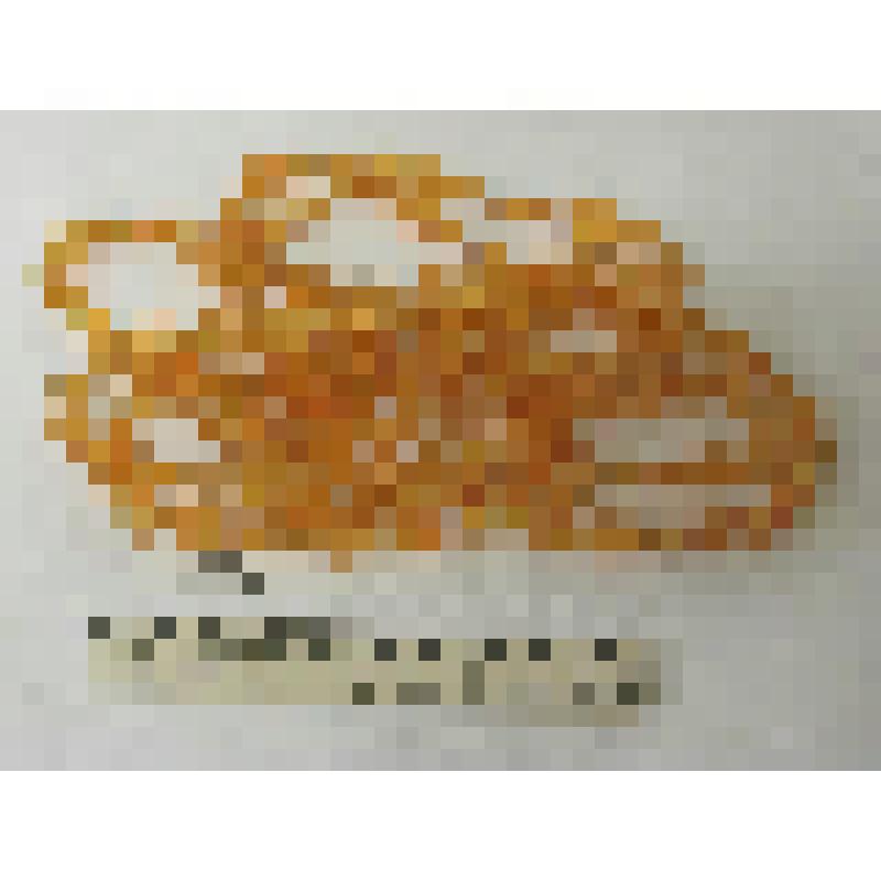 Бусы янтарного цвета из чередующихся бусин овальной и ромбовидной формы