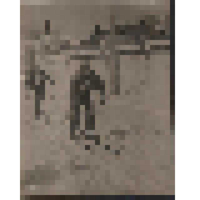 фотография. Участники лыжного кросса в городе Слободском, идущие по улице Ленина. Февраль, 1952