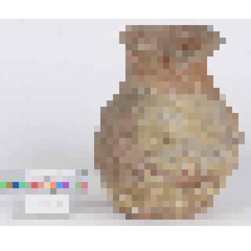 Приземистый округлобокий кувшин коричневой глины с отогнутым венчиком на конически сужающемся горле