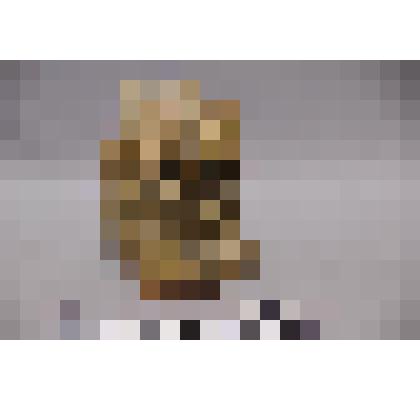 коллекция В.Ф. Лагодича. Нецке. В виде стоящего на подставке китайского (буддийского) льва. Лев в пасти держит каменный шар. Камень коричневого цвета