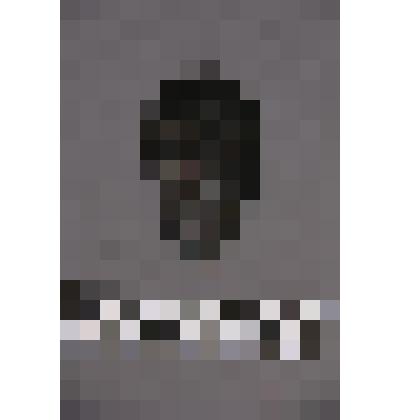 коллекция В.Ф. Лагодича. Талисман на металлической пластине, по мотивам изваяний окуневской культуры. Каплевидной формы с изображением 3-хглазой личины, прорезанными глазами и ртом. Огромным носом, занимающим центральную часть личины