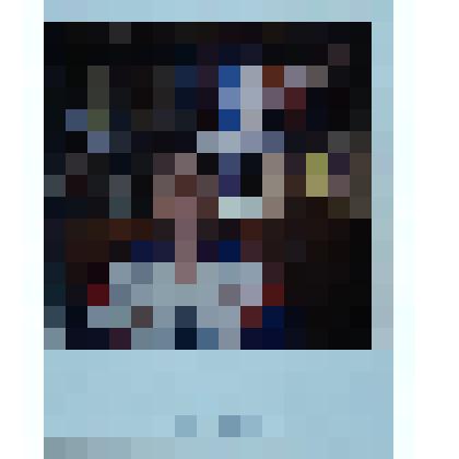 Фотография цветная с изображением тренера Татаринцева А.Г. на фоне наград