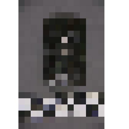 коллекция В.Ф. Лагодича. Талисман на металлической пластине, по мотивам изваяний окуневской культуры. Подпрямоугольная пластина с изображением 3-хглазой личины, прорезанными глазами, ртом и ноздрями. Разделена на 3 части горизонтальными линиями по уровню