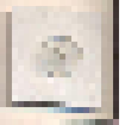 Пуговица круглой формы с двумя сквозными отверстиями, рубашечная