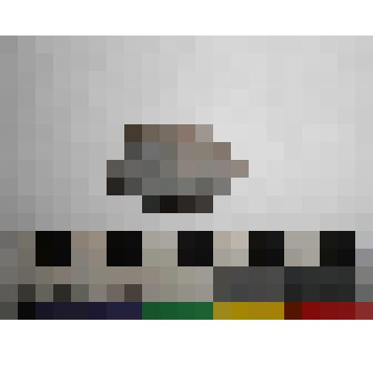 Археология. Фрагмент стенки сосуда, тёмно-серого цвета. Орнаментирован мелкими треугольными оттисками