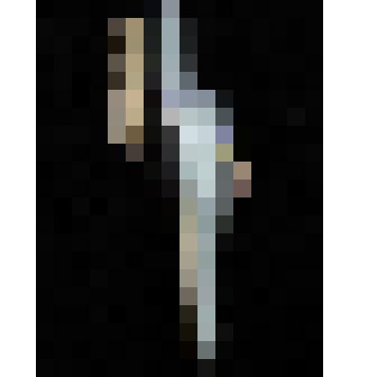 Электрощетка - пылесос "Ветерок" в металлическом корпусе черно-серого цвета.  Завод "Электробытовых приборов"