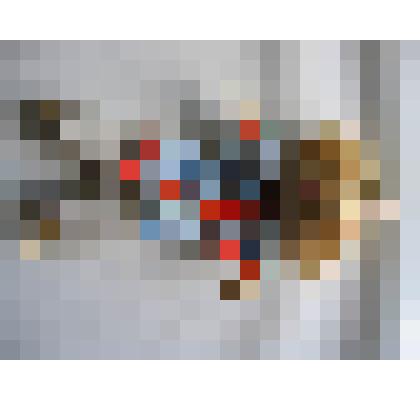 Кукла мочальная в виде парня в рубашке голубого цвета и холщовых белых брюках