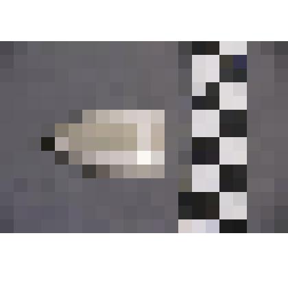 коллекция В.Ф. Лагодича. Талисман каменный лежачий, выполнен в виде головы человека. Камень белого цвета