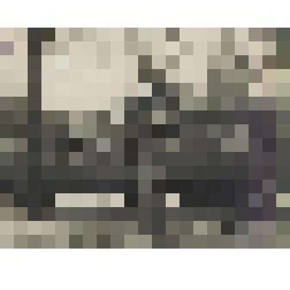 Фотография ч/б. Почтовый вагон Московско-Курской железной дороги, обслуживавший полевую почту западного и юго-западного фронтов. Рядом с ним начальник вагона