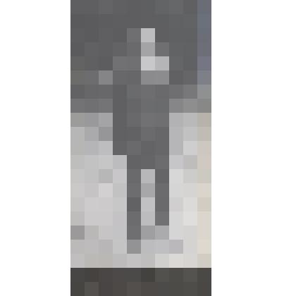 Л.Н.Толстой на площадке около дома (в рост, в темной блузе и круглой шапочке)