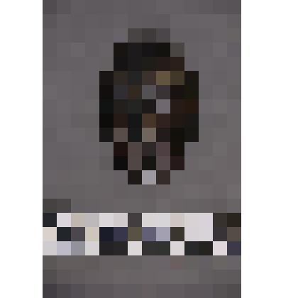 коллекция В.Ф. Лагодича. Талисман на металлической пластине в виде лица человека. Фольга наклеена на черную замшевую подкладку