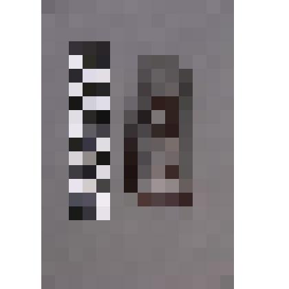 коллекция В.Ф. Лагодича. Деревянная пластина инкрустирована оловом. Изображена женщина танцующая и играющая на флейте