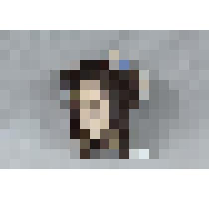 Изразец неправильной формы рельефный полихромный (правая часть панно) с изображением головы Вольги; цвета: темно-коричневый, светлый ультрамарин. 
Камин керамический, разноцветный, по рис. худ. Врубеля на тему "Микула Селянинович и Вольга"