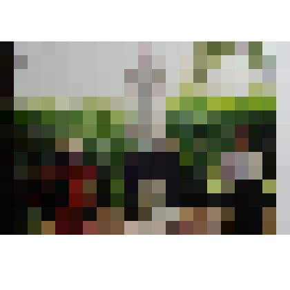 Фотография Ю. П. Бороденко с женой на могиле отца Бороденко П. Д. в д. Полунино у г. Ржев