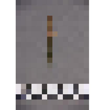 коллекция В.Ф. Лагодича. Меч миниатюрный. Является частью "Ритуальной курильницы" где находится в голове быка перед чашей. Клинок обоюдоострый из латуни, на рукоять припаяны 2 полоски меди с прочерченным изображением оплетки рукояти и навершием