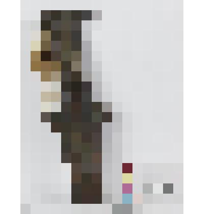 Верхняя часть кинжала медного с Т-образной головкой в виде сплющенного кольца, крестовиной из двух полусфер и жилой на клинке